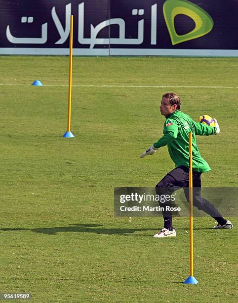 Tim Wiese, goalkeeper of Bremen throws the ball during the Werder Bremen training session at the Al Wasl training ground on January 7, 2010 in Dubai,...