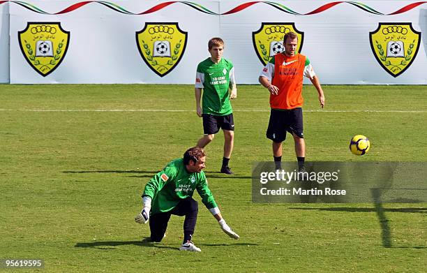 Tim Wiese, goalkeeper of Bremen focusses the ball during the Werder Bremen training session at the Al Wasl training ground on January 7, 2010 in...