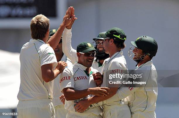 Ashwell Prince of South Africa celebrates his catch to get James Anderson of England for 9 runs during day 5 of the 3rd test match between South...