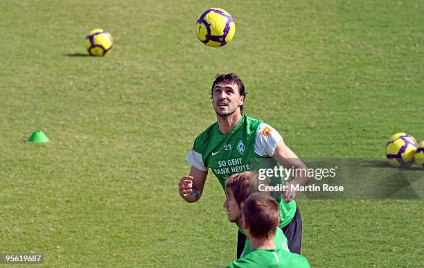 Hugo Almeida of Bremen heads the ball during the Werder Bremen training session at the Al Wasl training ground on January 7, 2010 in Dubai, United...