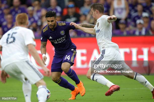 Dom Dwyer of Orlando City , Nick Besler of Real Salt Lake during the match between Orlando City v Real Salt Lake on May 6, 2018