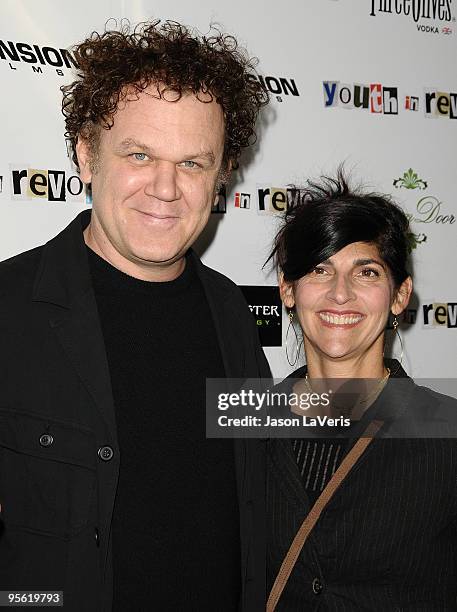 Actor John C. Reilly and wife Alison Dickey attend the premiere of "Youth In Revolt" at Mann Chinese 6 on January 6, 2010 in Los Angeles, California.