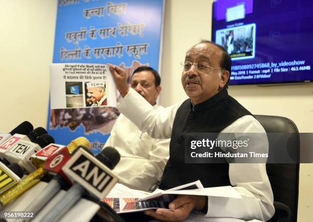 Delhi BJP leader and Union Minister Vijay Goel with BJP MLA from Mustafabad, East Delhi Jagdish Pradhan addresses a press conference over the issue...