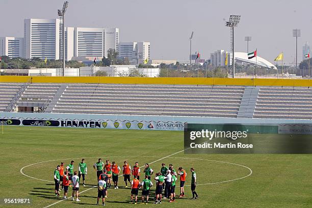 Thomas Schaaf ,head coach of Bremen speaks to the team during the Werder Bremen training session at the Al Wasl training ground on January 7, 2010 in...