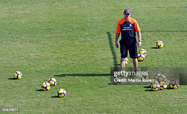 Thomas Schaaf, head coach of Bremen walks during the Werder Bremen training session at the Al Wasl training ground on January 7, 2010 in Dubai,...