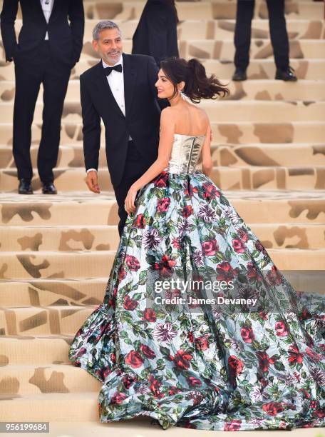 George Clooney and Amal Clooney attend the Heavenly Bodies: Fashion & The Catholic Imagination Costume Institute Gala at The Metropolitan Museum of...