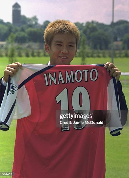 New Arsenal signing Japenese star Junichi Inamoto poses for the cameras during a press conference held in Colney, England. \ Mandatory Credit: Jamie...