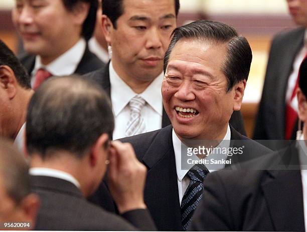 Secretary General of Democratic Party of Japan Ichiro Ozawa smiles during the a New Year party of the Japan Trade Union Confederation Tokyo at a...