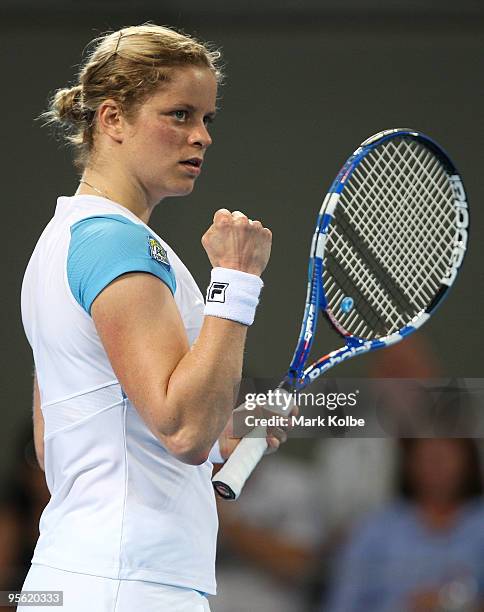 Kim Clijsters of Belgium celebrates winning a point in her quarter final match against Lucie Safarova of the Czech Republic during day five of the...