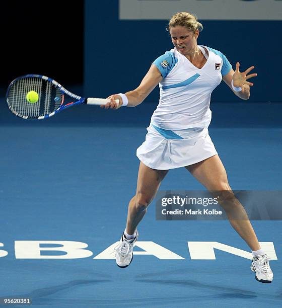 Kim Clijsters of Belgium plays a forehand in her quarter final match against Lucie Safarova of the Czech Republic during day five of the Brisbane...