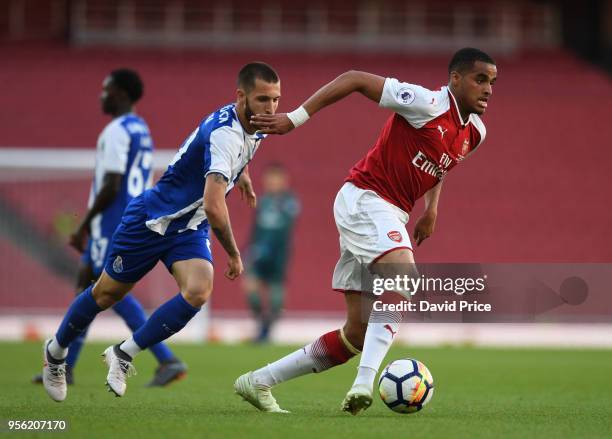 Yassin Fortune of Arsenal takes on Rui Moreira of Porto during the match between Arsenal and FC Porto at Emirates Stadium on May 8, 2018 in London,...