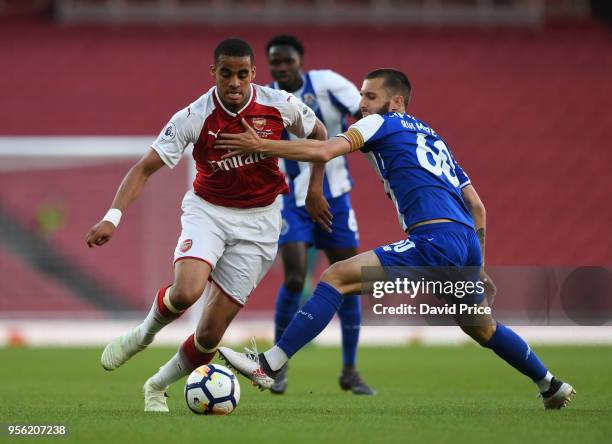 Yassin Fortune of Arsenal takes on Rui Moreira of Porto during the match between Arsenal and FC Porto at Emirates Stadium on May 8, 2018 in London,...