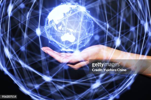 woman showing virtual global network - invention of photography is presented to the world stock pictures, royalty-free photos & images