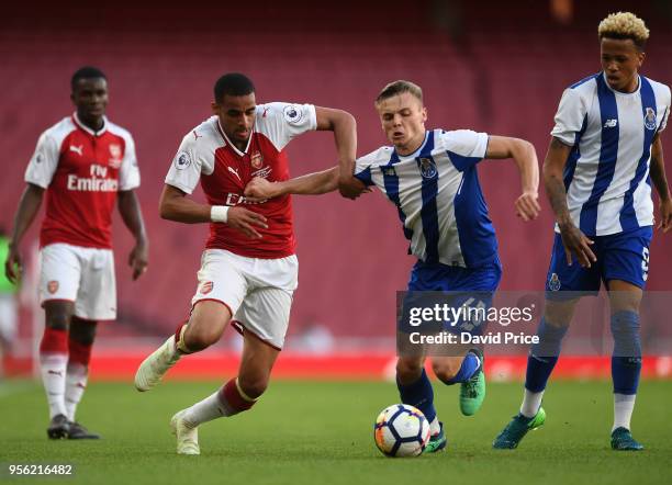 Yassin Fortune of Arsenal under pressure from Oleg Reabciuk of Porto during the match between Arsenal and FC Porto at Emirates Stadium on May 8, 2018...