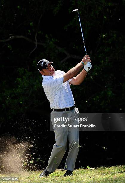 Hennie Otto of South Africa plays his approach shot on the 16th during the first round of the Africa Open at the East London Golf Club on January 7,...