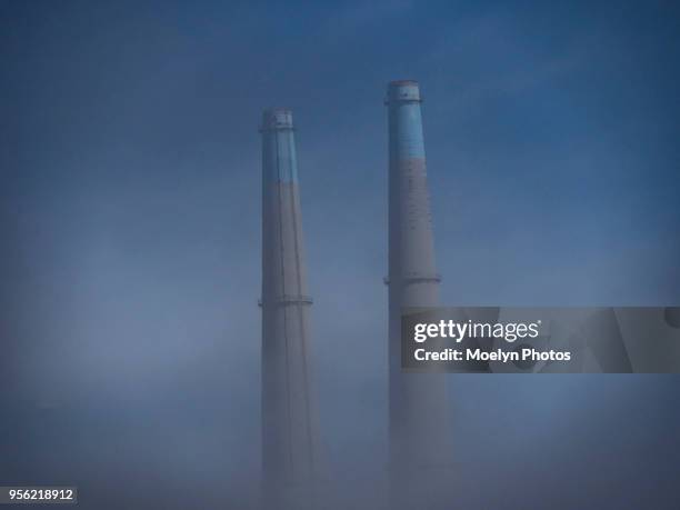 smoke stacks in the mist - moss landing stock pictures, royalty-free photos & images