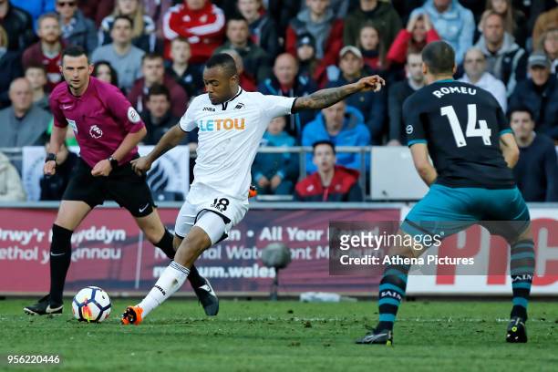 Jordan Ayew of Swansea City takes a shot during the Premier League match between Swansea City and Southampton at The Liberty Stadium on May 08, 2018...