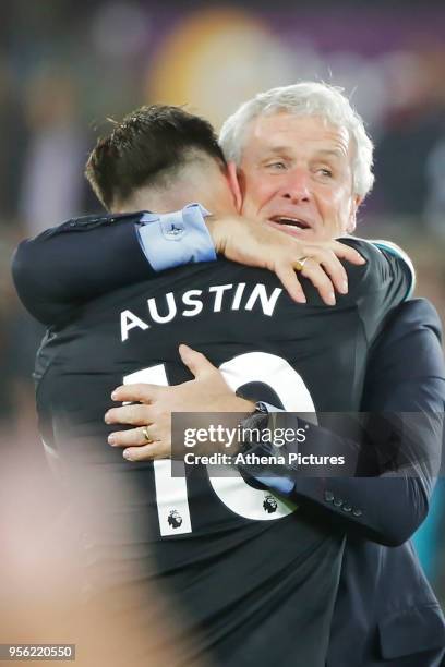 Southampton manager Mark Hughes celebrate his team's win during the Premier League match between Swansea City and Southampton at The Liberty Stadium...