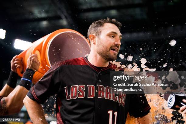 Pollock of the Arizona Diamondbacks gets doused with Gatorade after hitting a walk-off RBI single during a game against the Houston Astros at Chase...