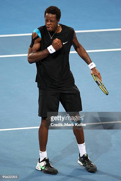 Gael Monfils of France celebrates winning his quarter final match against James Blake of the USA during day five of the Brisbane International 2010...
