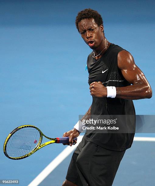 Gael Monfils of France celebrates winning a point in his quarter final match against James Blake of the USA during day five of the Brisbane...
