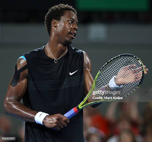 Gael Monfils of France applauds after losing a point in his quarter final match against James Blake of the USA during day five of the Brisbane...