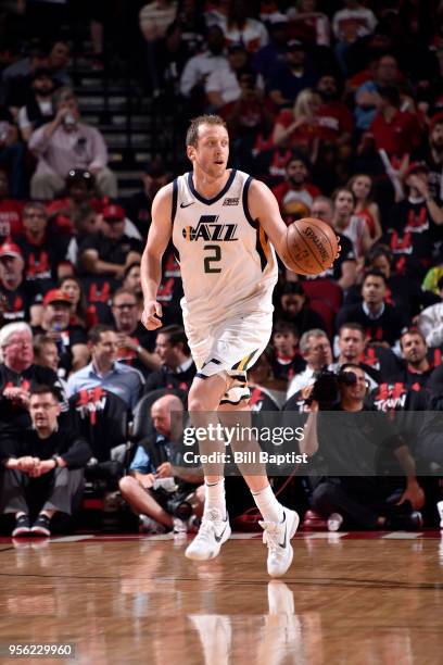 Joe Ingles of the Utah Jazz handles the ball against the Houston Rockets in Game Five of the Western Conference Semifinals of the 2018 NBA Playoffs...