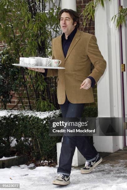 Jonathan Ross sighted outside his house making a statement regarding his resignation from the BBC on January 7, 2010 in London, England.