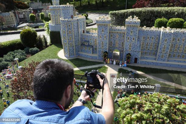 Photographer takes a photo of a brand new model of Windor Castle goes on permananent display to celebate the wedding of HRH Prince Harry and Meghan...