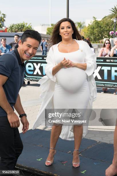 Eva Longoria and Mario Lopez visit "Extra" at Universal Studios Hollywood on May 8, 2018 in Universal City, California.