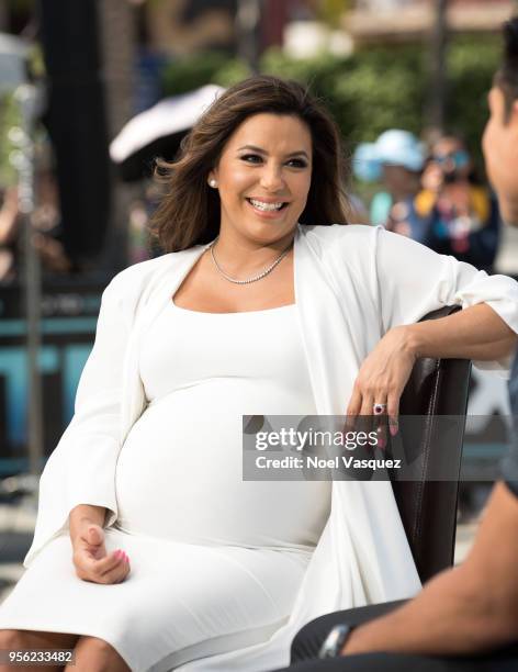 Eva Longoria visits "Extra" at Universal Studios Hollywood on May 8, 2018 in Universal City, California.