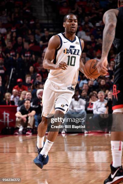 Alec Burks of the Utah Jazz handles the ball against the Houston Rockets in Game Five of the Western Conference Semifinals of the 2018 NBA Playoffs...