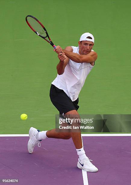 Lukasz Kubot Poland in action against Viktor Troicki of Serbia during the quarter final match of the ATP Qatar ExxonMobil Open at the Khalifa...