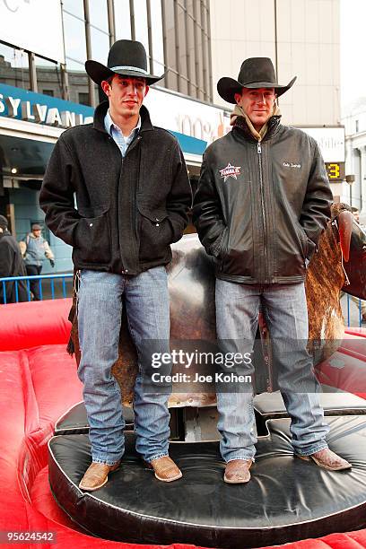 Bull riders J.B. Mauney and Kody Lostroh attend PBR's Mechanical Bull NYC Media Showdown outside of Madison Square Garden on January 7, 2010 in New...