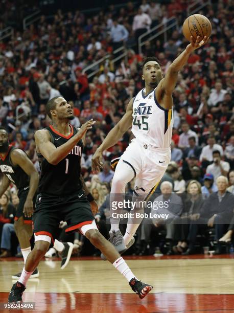 Donovan Mitchell of the Utah Jazz drives around Trevor Ariza of the Houston Rockets for a layup during Game Five of the Western Conference Semifinals...