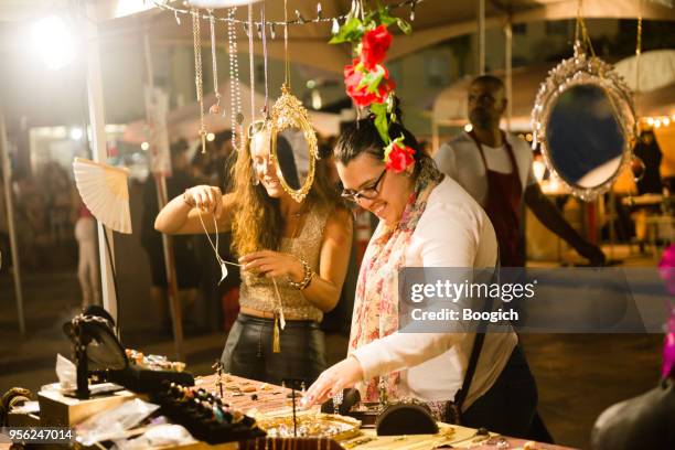women shop at pop up wynwood market - pop up store stock pictures, royalty-free photos & images