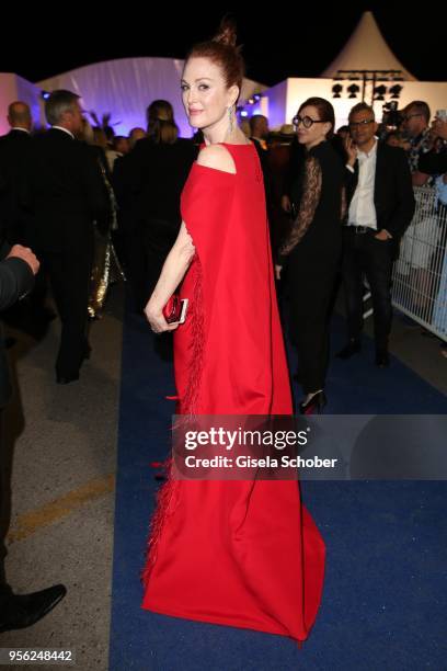 Julianne Moore leaves the screening of "Everybody Knows " and the opening gala and attends the gala dinner during the 71st annual Cannes Film...