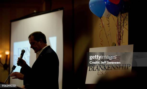 Senate Republican primary candidate Don Blankenship replaces the microphone after addressing supporters following a poor showing in the polls May 8,...