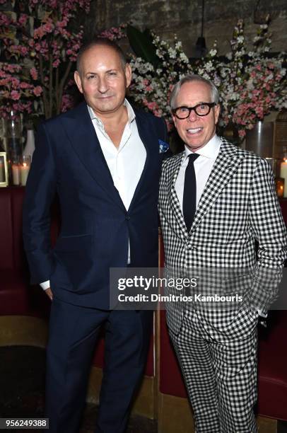 Designer Tommy Hilfiger and Executive Group President, The Estee Lauder Companies, Inc. John Demsey attend an intimate dinner hosted by The Business...