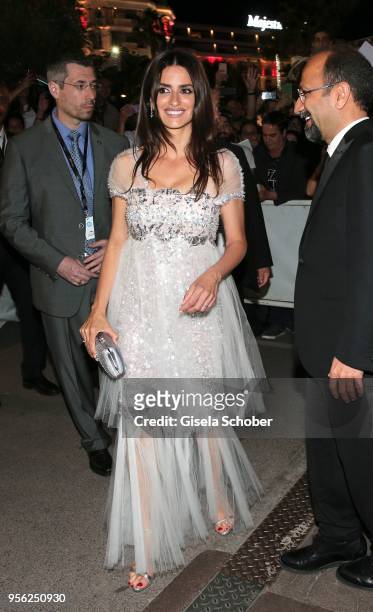 Penelope Cruz, Director Asghar Farhadi leaves the screening of "Everybody Knows " and the opening gala to gala dinner with fans during the 71st...