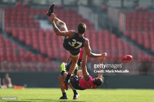 Rory Lobb and Jake Stein of the Giants collide during a Greater Western Sydney Giants AFL training session at Spotless Stadium on May 9, 2018 in...