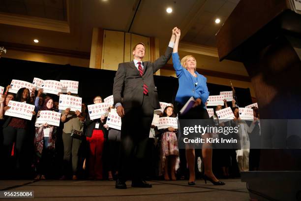 Democratic Gubernatorial candidate Richard Cordray is welcomed to the stage by his candidate for Lieutenant Governor Betty Sutton, after winning the...