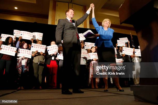 Democratic Gubernatorial candidate Richard Cordray is welcomed to the stage by his candidate for Lieutenant Governor Betty Sutton, after winning the...