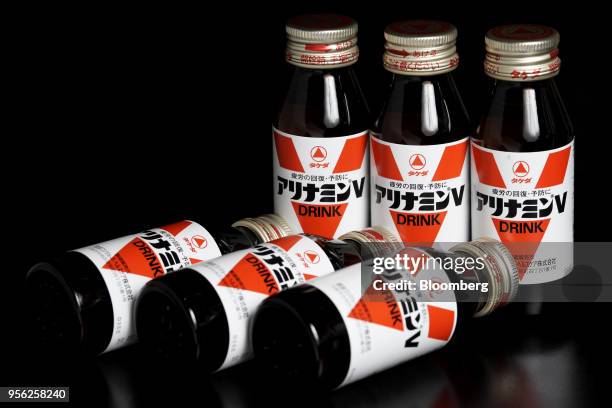 Bottles of Alinamin V energy drink, manufactured by Takeda Consumer Healthcare Co., a subsidiary of Takeda Pharmaceutical Co., are arranged for a...