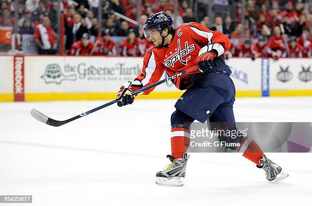 Alex Ovechkin of the Washington Capitals shoots the puck against the Montreal Canadiens at the Verizon Center on January 5, 2010 in Washington, DC....