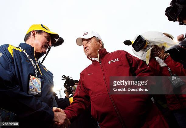 Head coach Bobby Bowden of the Florida State Seminoles is greeted by the Governor of West Virginia, Joe Manchin III, before taking on the West...