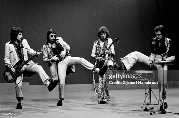Mud perform live at Hilversum TV Studios, Holland in 1974. L-R Ray Stiles,Les Gray, Rob Davis, Dave Mount