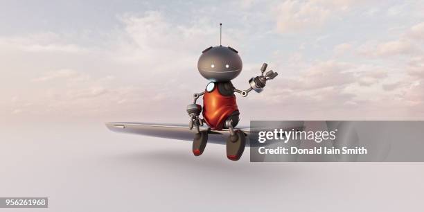 friendly smiling helper robot sits on smart phone - alexa pano stock pictures, royalty-free photos & images