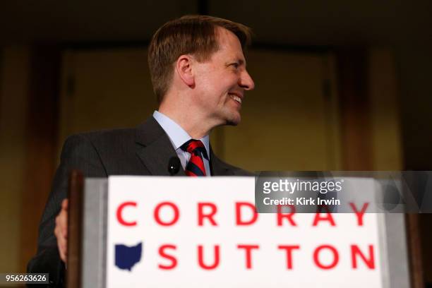 Democratic Gubernatorial candidate Richard Cordray looks over to his supporters while speaking to an assembled crowd after winning the Democratic...