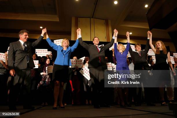 Democratic Lieutenant Governor nominee Betty Sutton and Democratic Gubernatorial nominee Richard Cordray celebrate with their families after speaking...